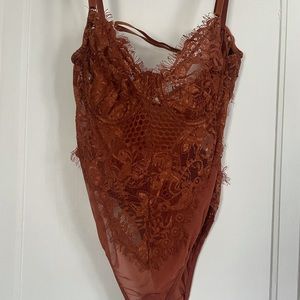 Lace body suit. Size large